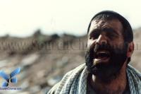 اصغر نقی زاده در نمایی از فیلم «چشم شیشه ای»